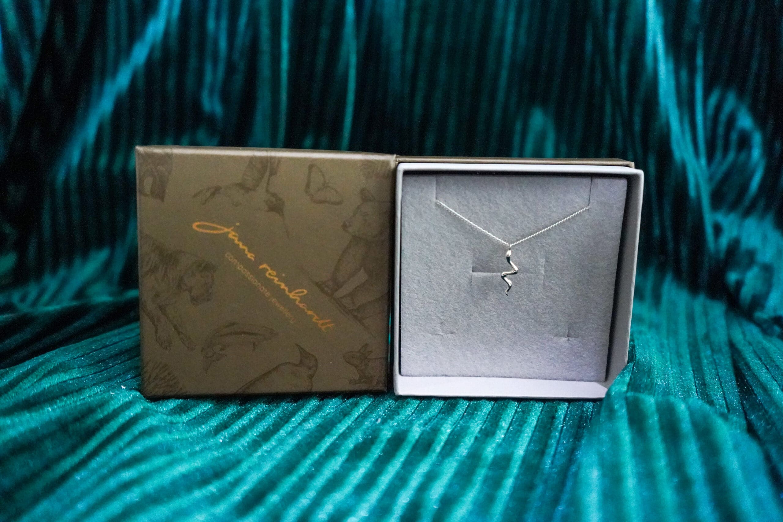 Christmas Gift Guide 2024 23 Jane Reinhardt Tiny Snake Pendant Necklace